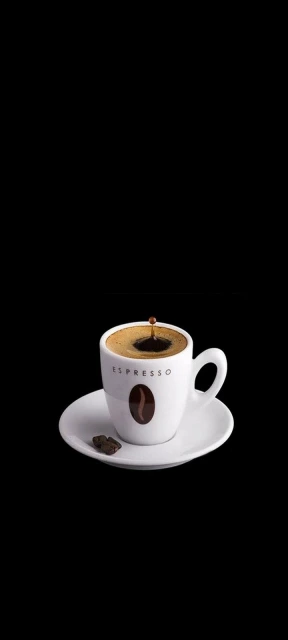 Espresso cup with coffee bean