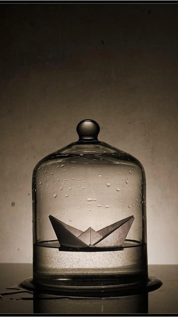 Paper Boat Under Glass Dome