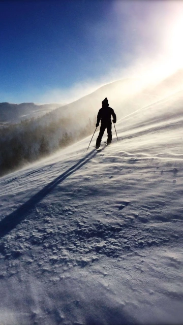 A Man in Snowy Mountains