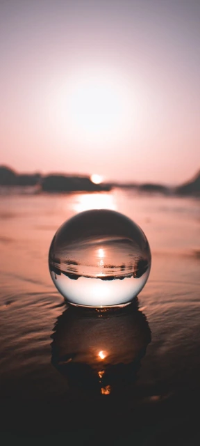 Glass Sphere on Beach