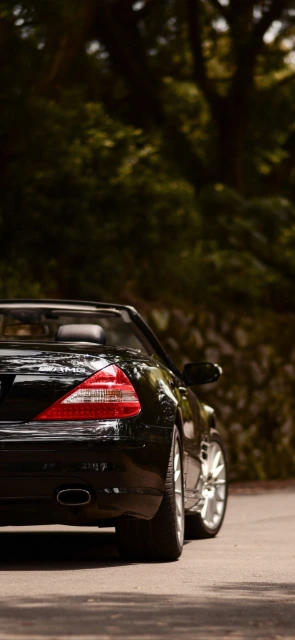 Black Mercedes AMG Convertible Rear View