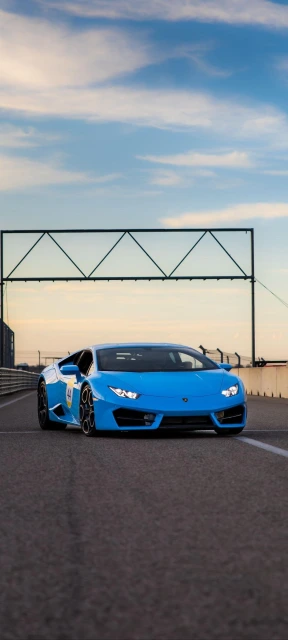 Blue Lamborghini on Race Track