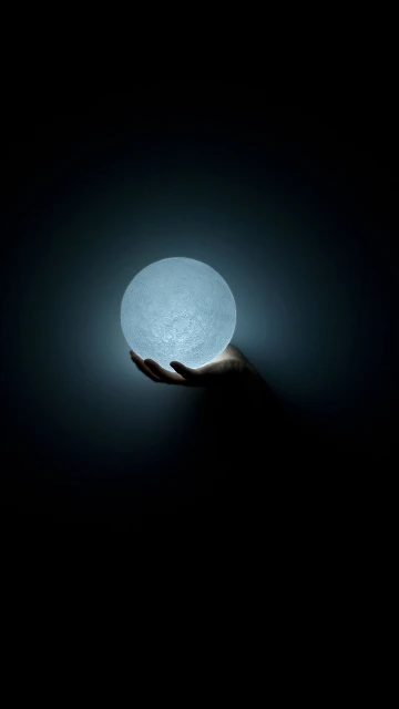 Hand Holding Moon Lamp