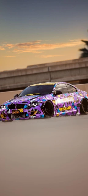 Purple Vinyl Wrapped Car at Sunset