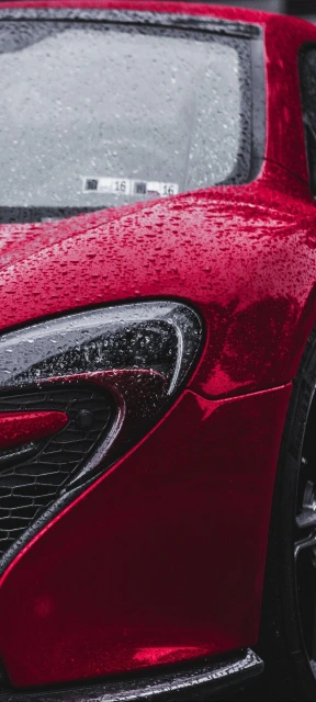Red Sports Car With Raindrops