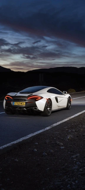 White McLaren on Road at Dusk 1