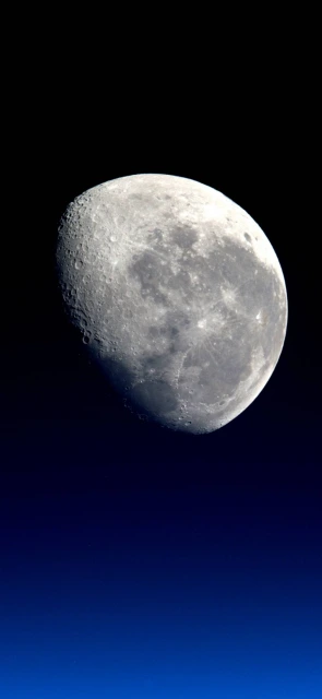 Moon Against Blue Sky