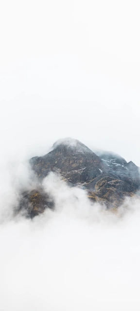 Mountain Peak in Clouds