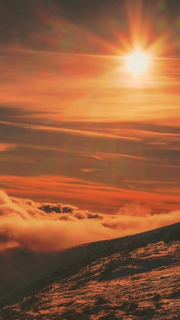 Sunset Over Snowy Mountains