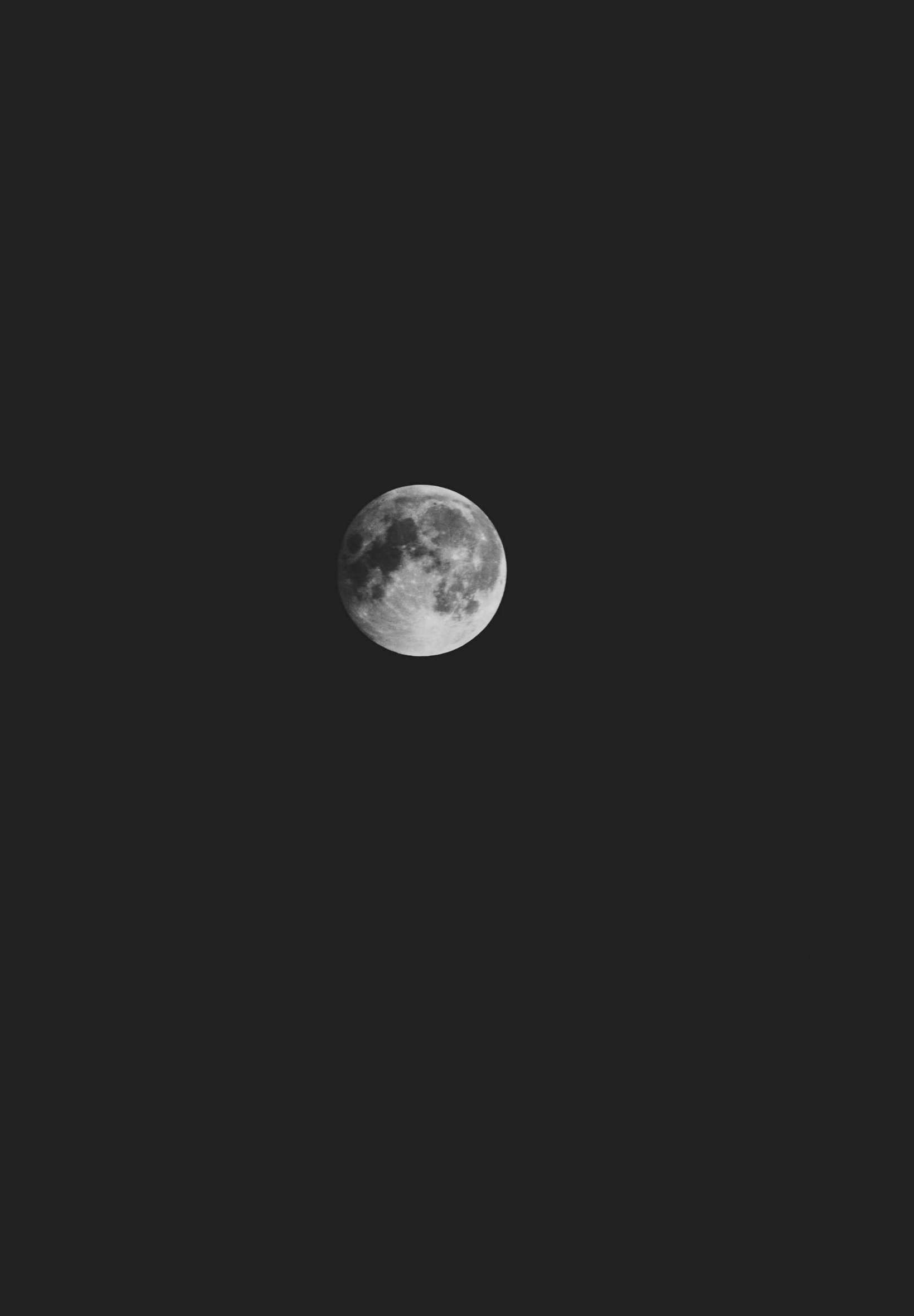 Download Enigmatic Half Moon Shining in the Dark Sky - 4K Ultra HD Wallpaper  for Phones Wallpaper | Wallpapers.com